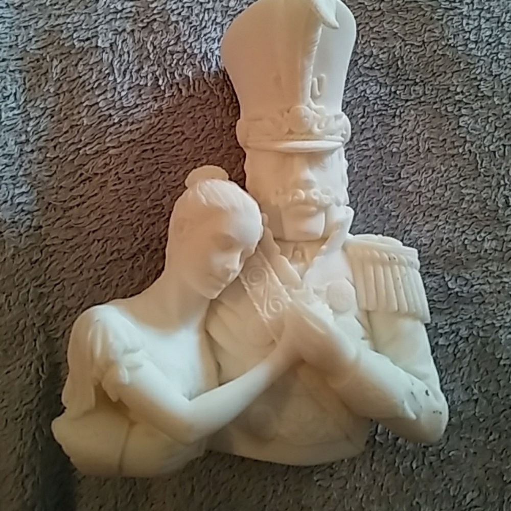 Christmas soldier and wife carved sculpture.